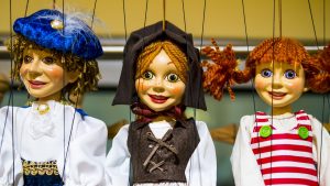 Row of traditional puppets