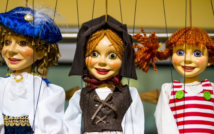 Row of traditional puppets