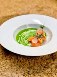 Easter dish with green sauce and salmon in Panorama Prague